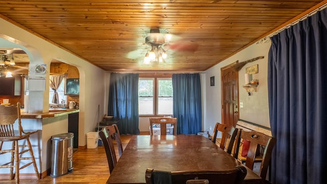 1160 Bethel Ave, Mammoth Spring, AR 72554 - dining space with wooden ceiling, arched walkways, and wood finished floors