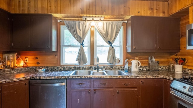 1160 Bethel Ave, Mammoth Spring, AR 72554 - kitchen with stainless steel appliances, dark countertops, wooden ceiling, and backsplash