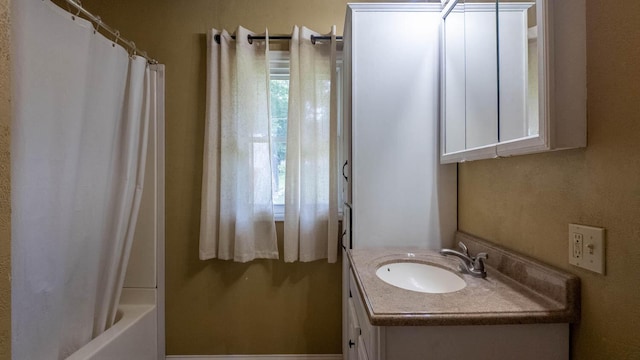 1160 Bethel Ave, Mammoth Spring, AR 72554 - full bathroom with vanity and shower / tub combo