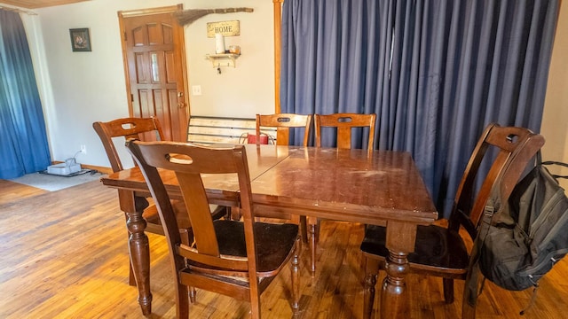 1160 Bethel Ave, Mammoth Spring, AR 72554 - dining space with light wood-type flooring and baseboards