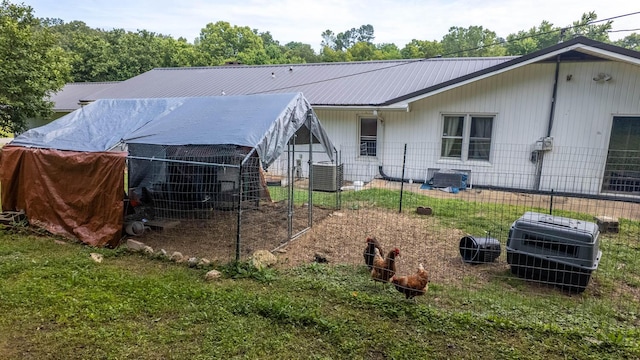 1160 Bethel Ave, Mammoth Spring, AR 72554 - back of house with a metal roof and exterior structure