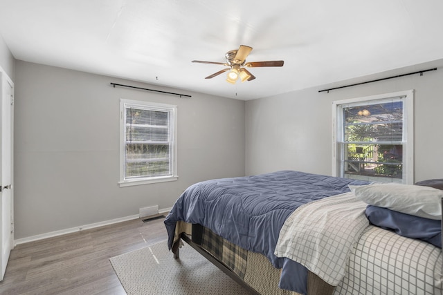 1547 S Kickapoo Ave, Springfield, MO 65804 - bedroom featuring wood finished floors and a ceiling fan