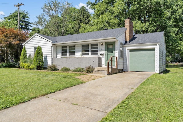 1547 S Kickapoo Ave, Springfield, MO 65804 - view of front of house featuring a chimney, concrete driveway, a garage, brick siding, and a shingled roof