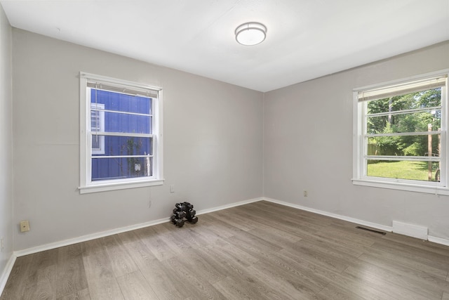 1547 S Kickapoo Ave, Springfield, MO 65804 - unfurnished room with wood finished floors