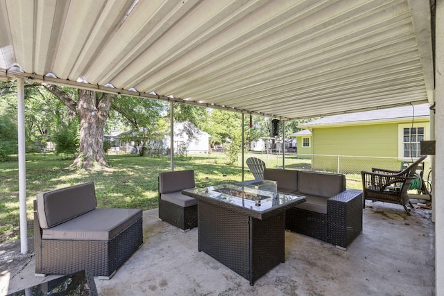 1547 S Kickapoo Ave, Springfield, MO 65804 - view of patio featuring an outdoor living space with a fire pit