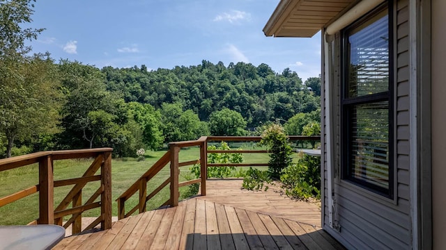4534 Bayou Access Rd, Mammoth Spring, AR 72554 - wooden terrace featuring a view of trees and a lawn
