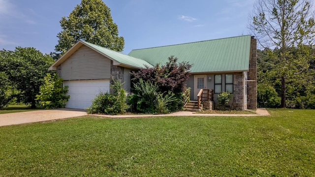 4534 Bayou Access Rd, Mammoth Spring, AR 72554 - view of front of home with a front yard, a metal roof, a chimney, driveway, and an attached garage