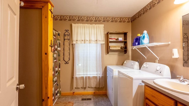 4534 Bayou Access Rd, Mammoth Spring, AR 72554 - laundry room with washing machine and clothes dryer and baseboards