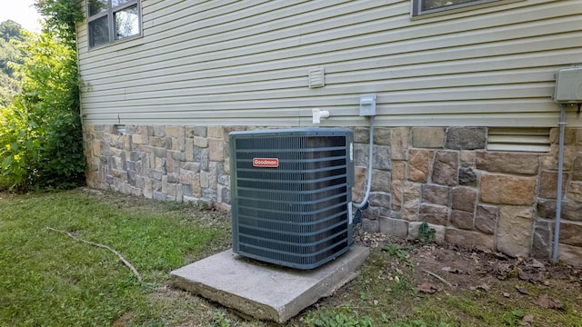 4534 Bayou Access Rd, Mammoth Spring, AR 72554 - exterior view of a cooling unit and stone siding