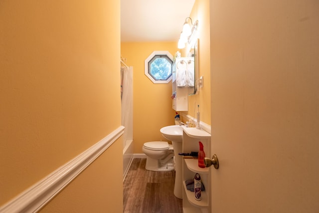 220 E Portland St, Springfield, MO 65807 - bathroom with wood finished floors and shower / bathtub combination with curtain