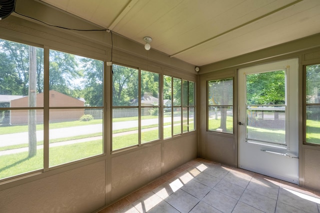 220 E Portland St, Springfield, MO 65807 - unfurnished sunroom featuring tile patterned flooring