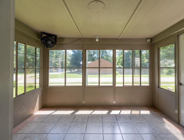 220 E Portland St, Springfield, MO 65807 - unfurnished sunroom featuring tile patterned flooring