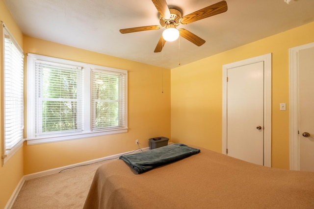 220 E Portland St, Springfield, MO 65807 - carpeted bedroom with baseboards and a ceiling fan