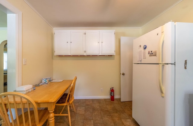 220 E Portland St, Springfield, MO 65807 - dining space featuring ornamental molding