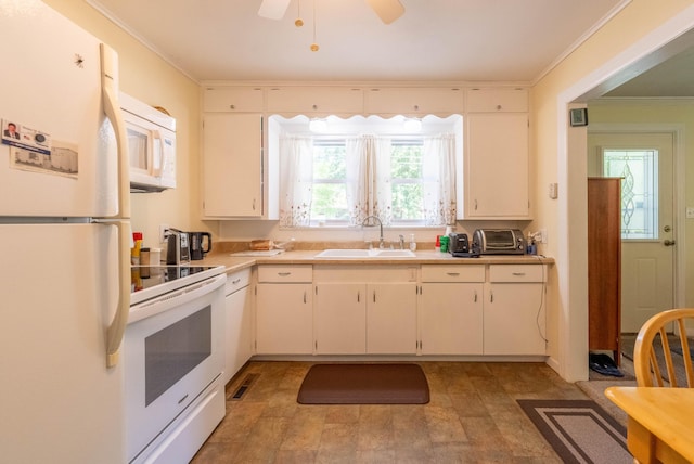 220 E Portland St, Springfield, MO 65807 - kitchen featuring white appliances, ornamental molding, light countertops, a ceiling fan, and white cabinetry
