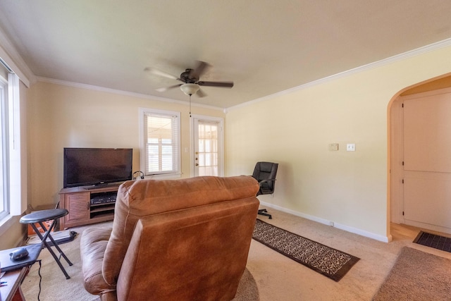 220 E Portland St, Springfield, MO 65807 - living room featuring arched walkways, ornamental molding, healthy amount of natural light, and a ceiling fan