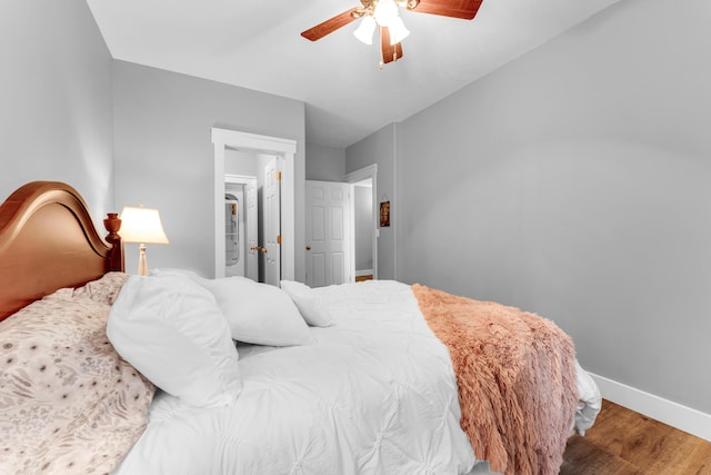 3318 Winged Foot Dr, Nixa, MO 65714 - bedroom featuring wood finished floors and a ceiling fan