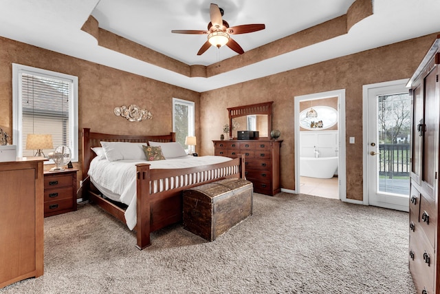 3318 Winged Foot Dr, Nixa, MO 65714 - bedroom featuring access to outside, light carpet, ensuite bath, and ceiling fan