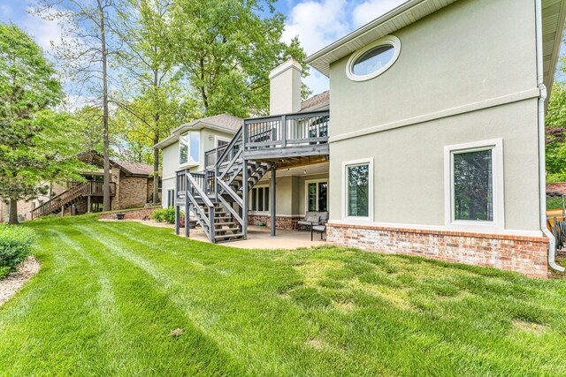 3318 Winged Foot Dr, Nixa, MO 65714 - back of property featuring stairs, a wooden deck, stucco siding, and a patio