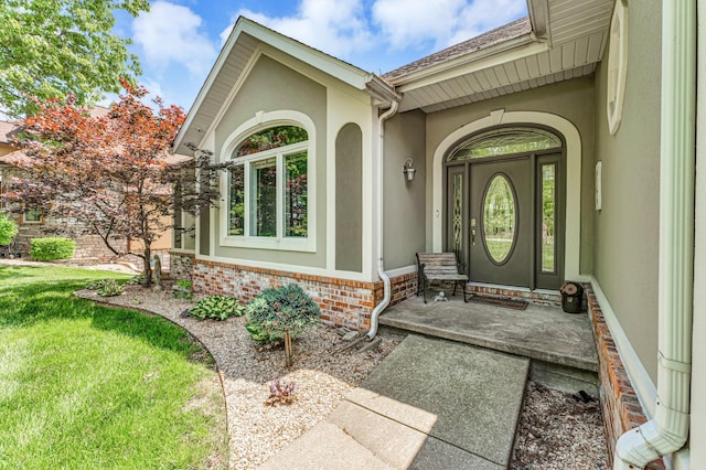 3318 Winged Foot Dr, Nixa, MO 65714 - entrance to property with stucco siding and a yard