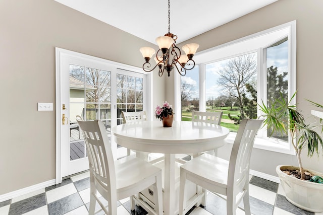 3318 Winged Foot Dr, Nixa, MO 65714 - dining space with a chandelier and baseboards