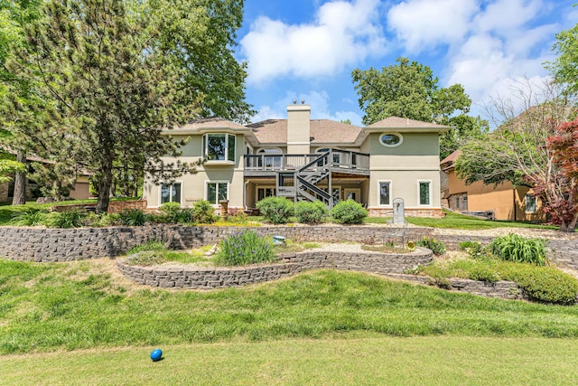 3318 Winged Foot Dr, Nixa, MO 65714 - back of property featuring stucco siding, a wooden deck, stairway, and a chimney