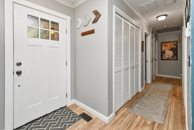 111 E Yorkshire St, Nixa, MO 65714 - foyer featuring crown molding and light wood finished floors