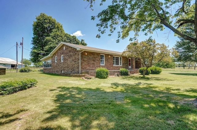 13762 State Highway Z, Verona, MO 65769 - view of home's exterior with brick siding and a yard