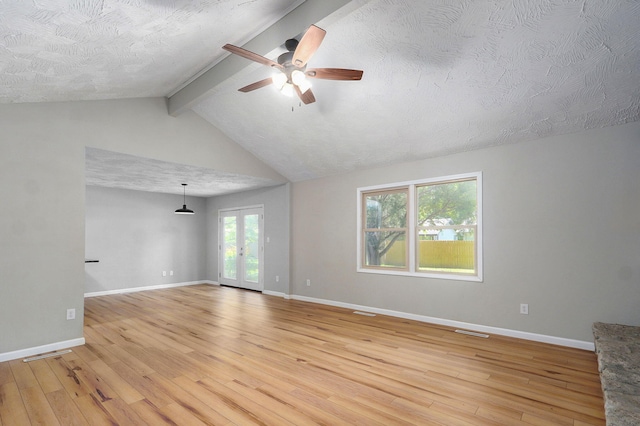 3656 S Kansas Ave, Springfield, MO 65807 - empty room with light wood-type flooring, ceiling fan, french doors, and a textured ceiling