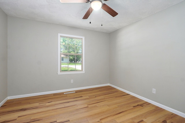 3656 S Kansas Ave, Springfield, MO 65807 - empty room featuring wood finished floors and ceiling fan