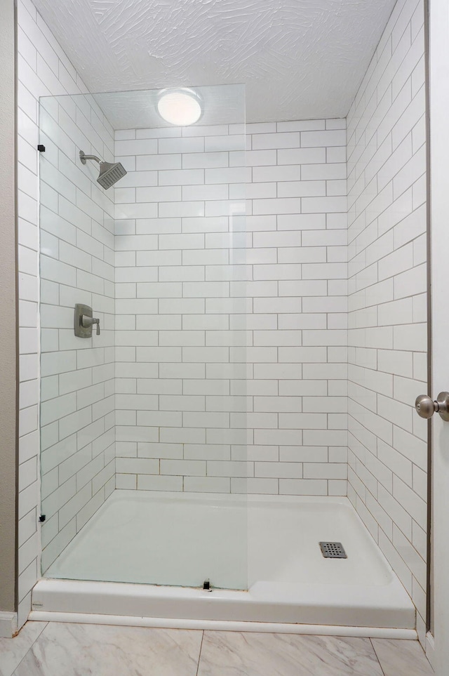 3656 S Kansas Ave, Springfield, MO 65807 - full bathroom featuring a stall shower and marble finish floors