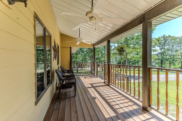 10675 State Highway Aa, Grovespring, MO 65662 - porch with a ceiling fan and view of wooded area