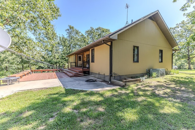 10675 State Highway Aa, Grovespring, MO 65662 - rear view of house featuring a patio area, a yard, and a deck