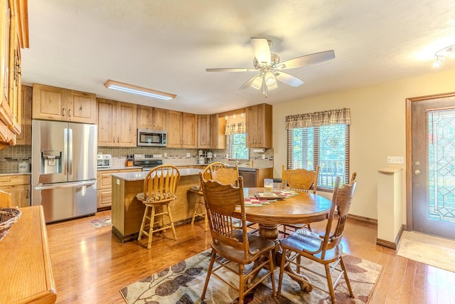 10675 State Highway Aa, Grovespring, MO 65662 - dining area featuring light wood finished floors and a ceiling fan