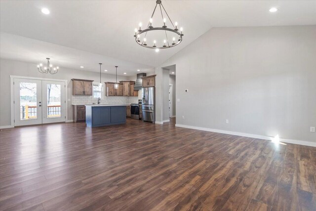 2803 Town Dr, Mountain Grove, MO 65711 - unfurnished living room featuring a chandelier, dark wood-style floors, recessed lighting, french doors, and high vaulted ceiling
