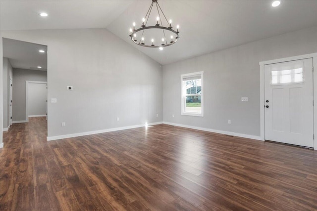 2803 Town Dr, Mountain Grove, MO 65711 - foyer entrance featuring a chandelier, lofted ceiling, dark wood-type flooring, and recessed lighting