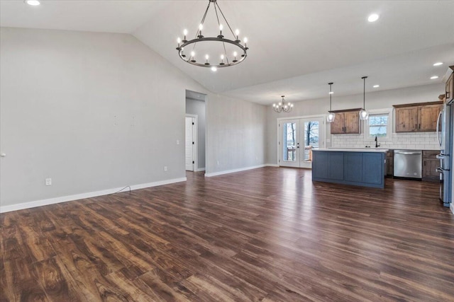 2803 Town Dr, Mountain Grove, MO 65711 - unfurnished living room featuring a chandelier, vaulted ceiling, dark wood finished floors, recessed lighting, and french doors