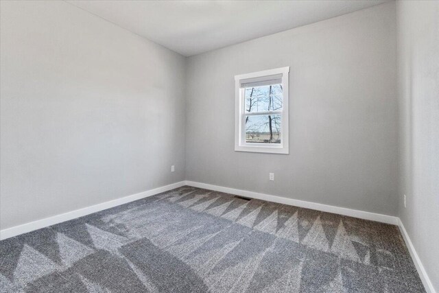2803 Town Dr, Mountain Grove, MO 65711 - empty room featuring carpet and baseboards