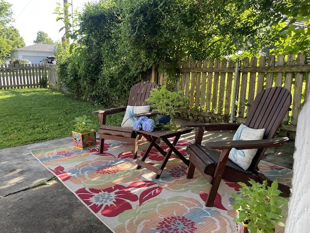 428 N Olive St, Marshfield, MO 65706 - fenced backyard with a patio area