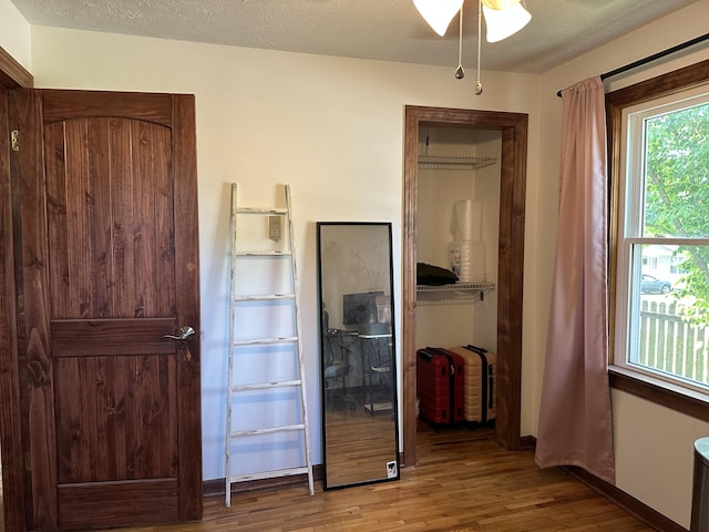 428 N Olive St, Marshfield, MO 65706 - bedroom with wood finished floors and a closet