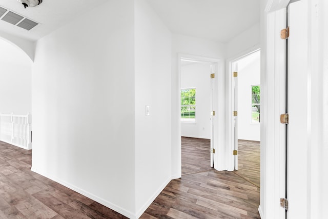 639 N Althea Ave, Nixa, MO 65714 - hallway featuring arched walkways and wood finished floors