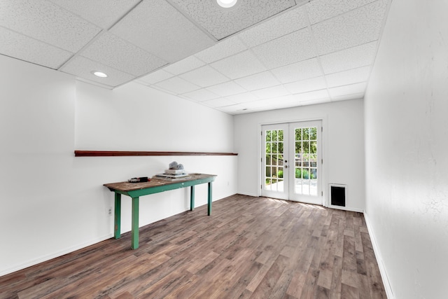 639 N Althea Ave, Nixa, MO 65714 - empty room with wood finished floors, a drop ceiling, and french doors