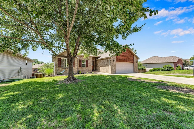 639 N Althea Ave, Nixa, MO 65714 - view of front facade featuring concrete driveway, brick siding, and a garage
