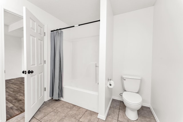 639 N Althea Ave, Nixa, MO 65714 - bathroom with shower / bath combo with shower curtain and tile patterned flooring