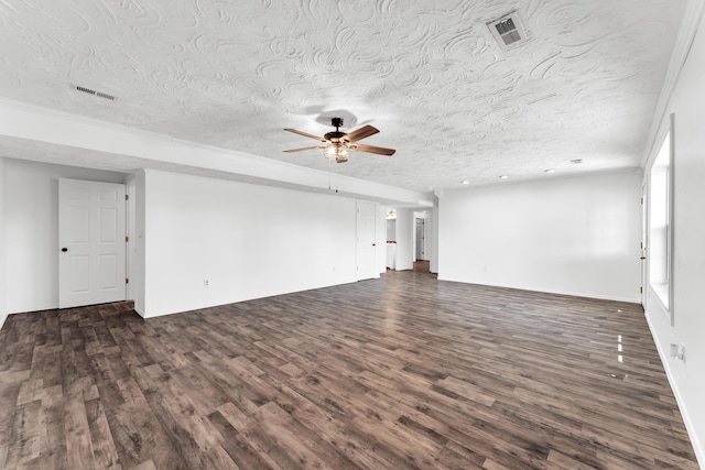 639 N Althea Ave, Nixa, MO 65714 - unfurnished living room with dark wood-style flooring, ceiling fan, and a textured ceiling