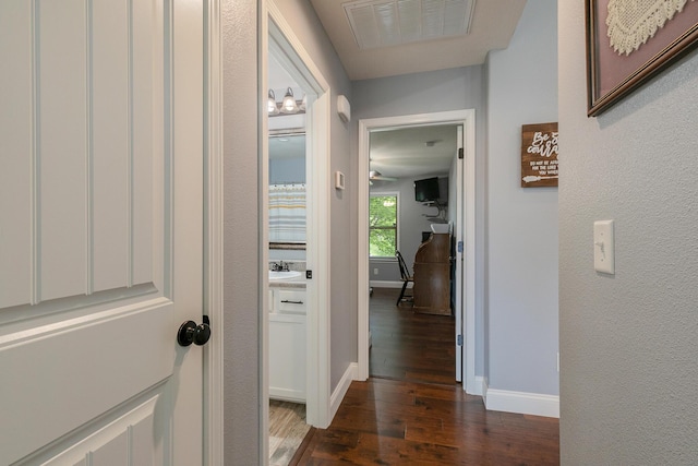 1925 E Costa Mesa Ct, Ozark, MO 65721 - corridor with dark wood finished floors and baseboards