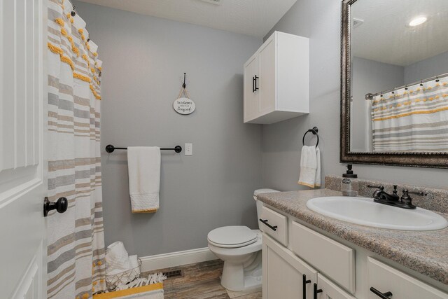 1925 E Costa Mesa Ct, Ozark, MO 65721 - full bathroom featuring vanity, wood finished floors, and curtained shower