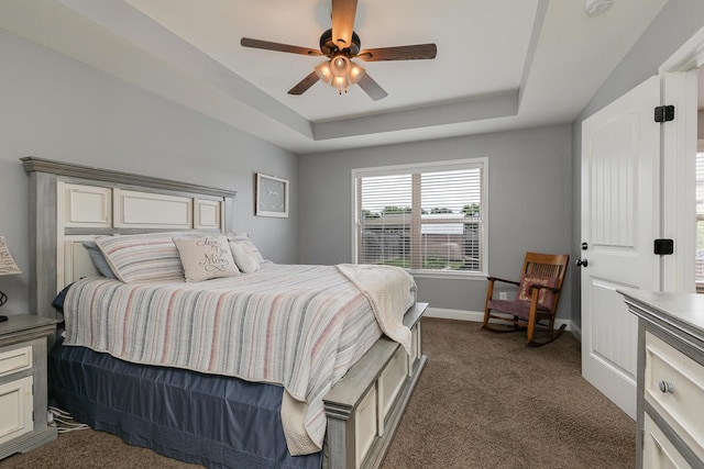 1925 E Costa Mesa Ct, Ozark, MO 65721 - bedroom with dark colored carpet, a tray ceiling, and ceiling fan