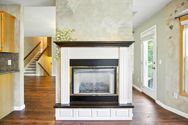 4939 S Prairie View Ave, Battlefield, MO 65619 - detailed view of wood finished floors and a glass covered fireplace