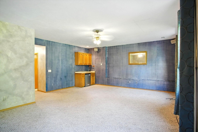 4939 S Prairie View Ave, Battlefield, MO 65619 - unfurnished living room featuring a ceiling fan and carpet